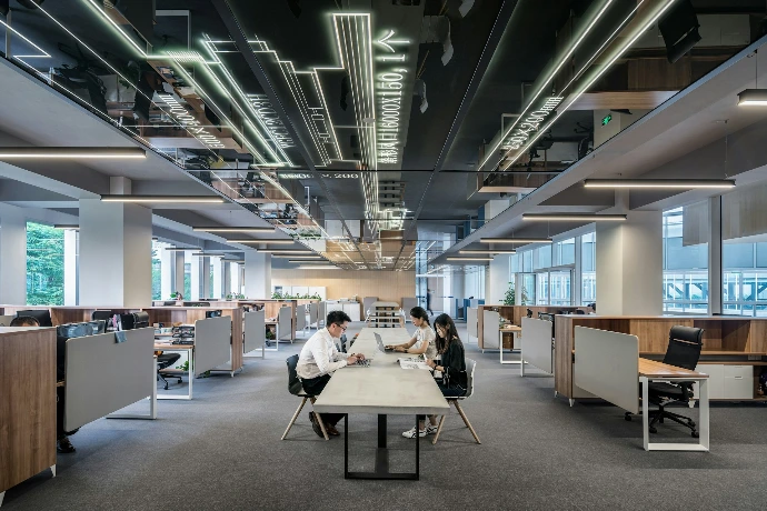 Open-plan office with people working at desks