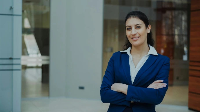 Confident businesswoman standing in a modern office
